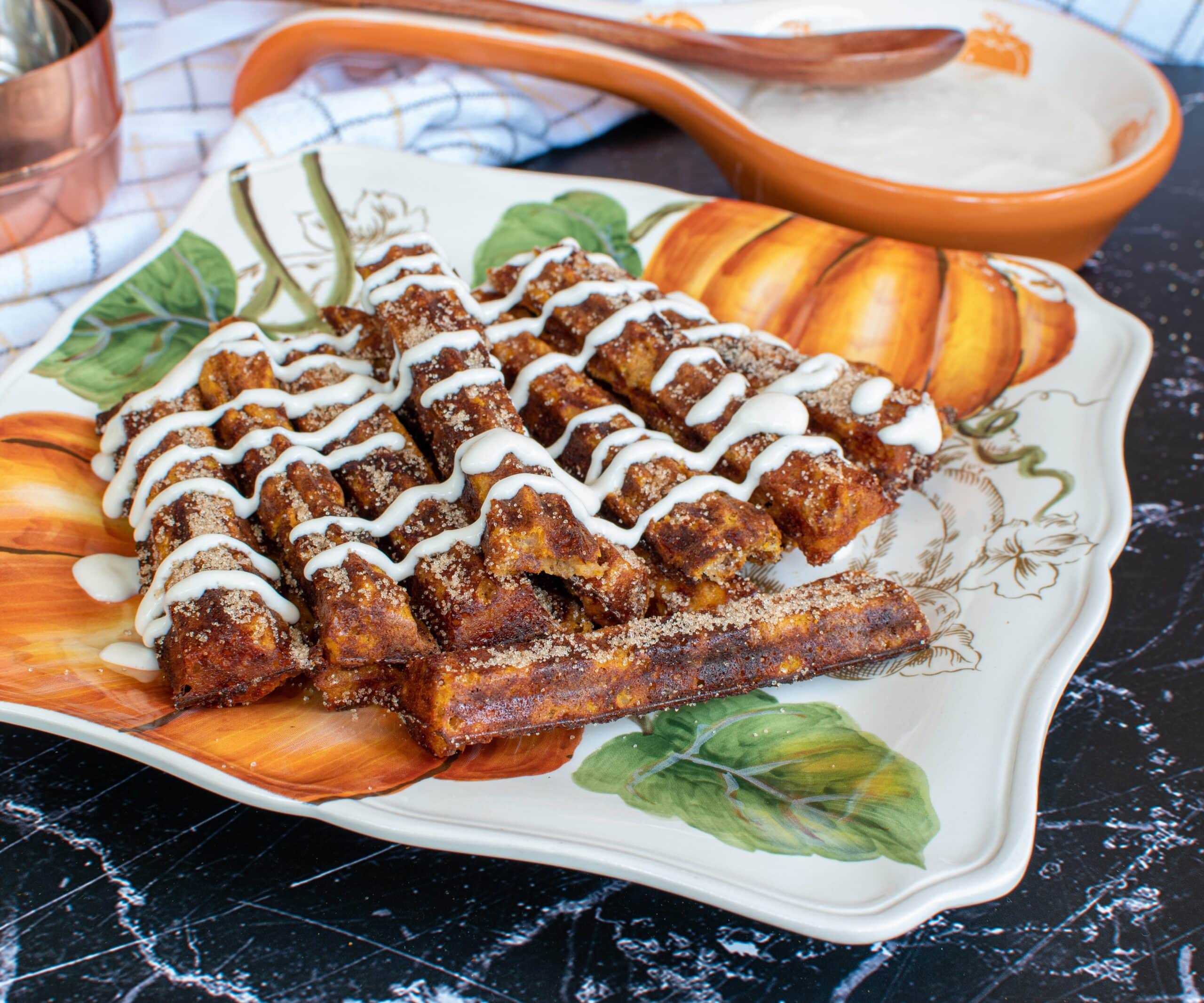 Keto Pumpkin Chaffle Churros with maple cream cheese icing
