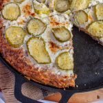 low carb dill pickle pizza served on a cast iron pan