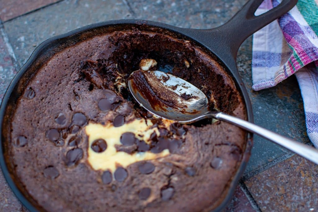 gluten free black bottom brownie in cast iron pan