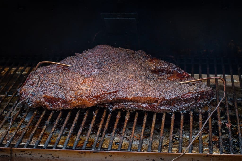 texas brisket with two temperature probes cooked on RecTec 700 pellet smoker