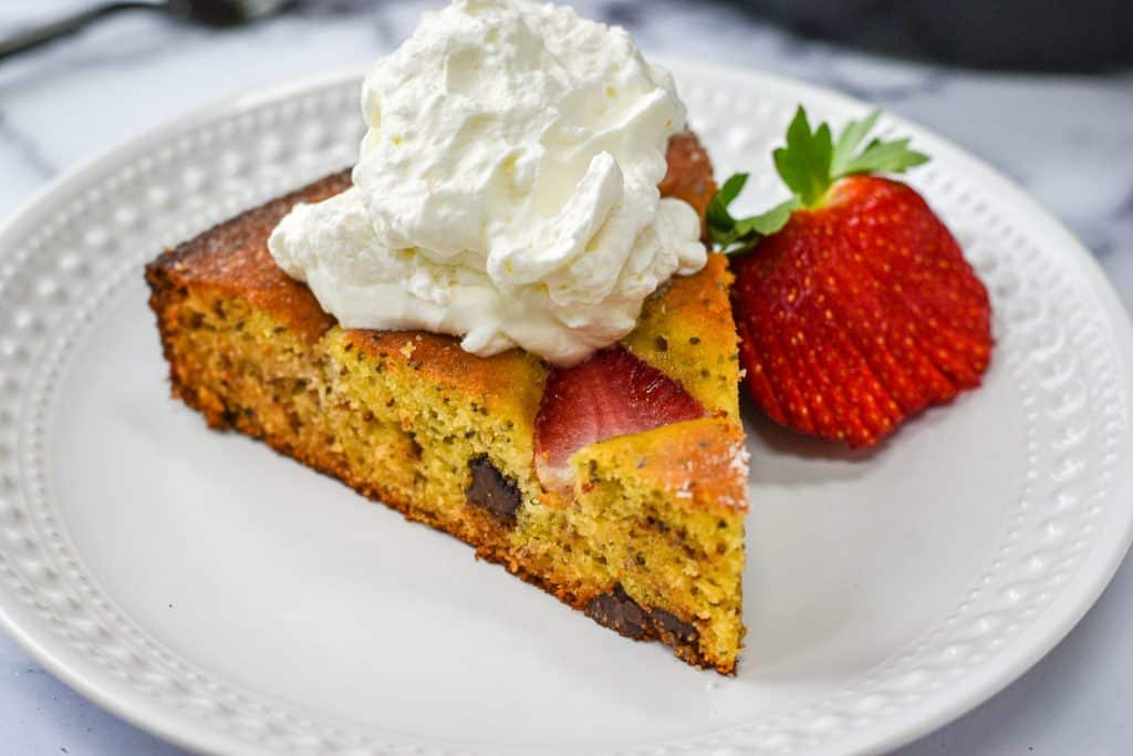 dairy free gluten free olive oil cake with chocolate and strawberries