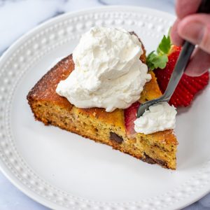 Strawberry Chocolate Olive oil cake topped with whipped cream