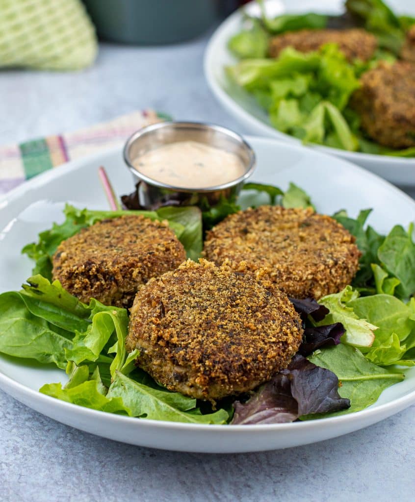 Crispy Piccata keto fish cakes coated in pork king good breadcrumbs with spicy lemon caper aioli