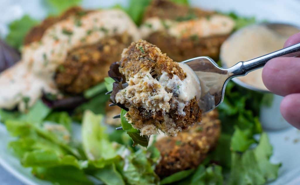 a bite of crispy piccata fish cakes