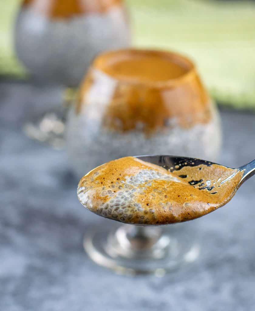 a spoon of keto Dalgona coffee with chia pudding