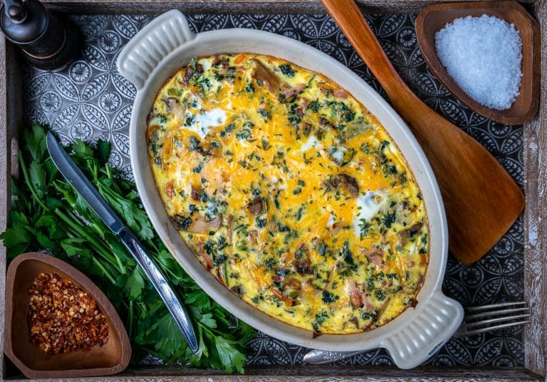 low carb crustless quiche loaded with meat and vegetables