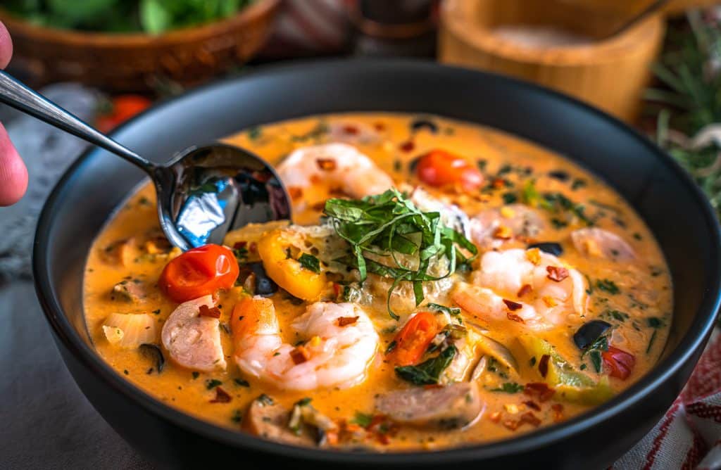 Spicy Calabrian Chile Tomato Soup with sausage and shrimp