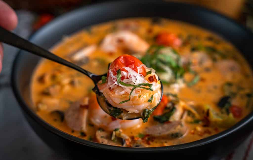 Spicy Calabrian Chile Tomato Soup with sausage and shrimp