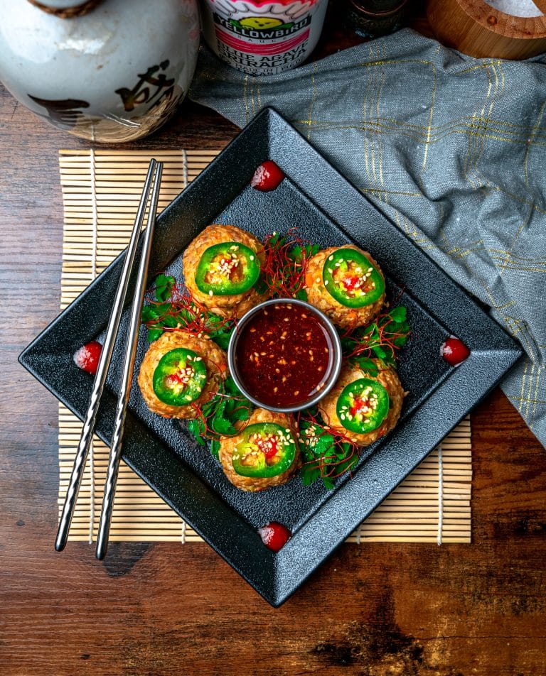 low carb thai chicken meatballs served on a square black plate