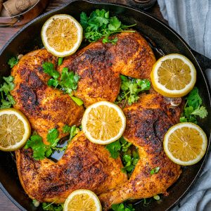 Lemon Pepper Chicken Leg Quarters in the oven Cast Iron skillet