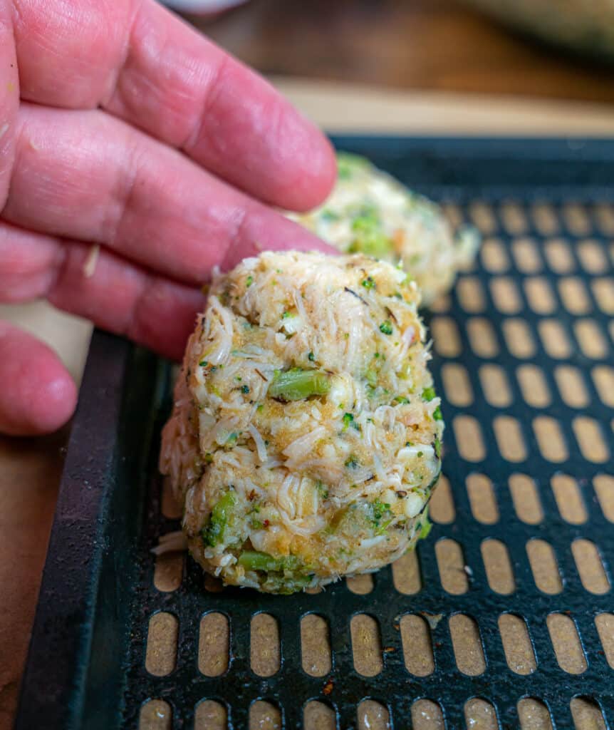 forming keto chicken nuggets and placing on a air fryer