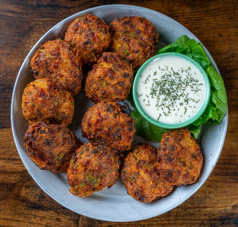 keto broccoli cheese chicken nuggets on a plate with ranch