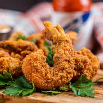 Crispy Keto Fried Shrimp on a cutting board