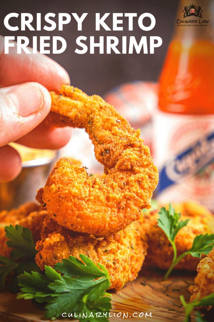 crispy keto fried shrimp with hot sauce in the background