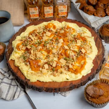 pumpkin spice butter board topped with keto honey, pumpkin seeds and pumpkin spice