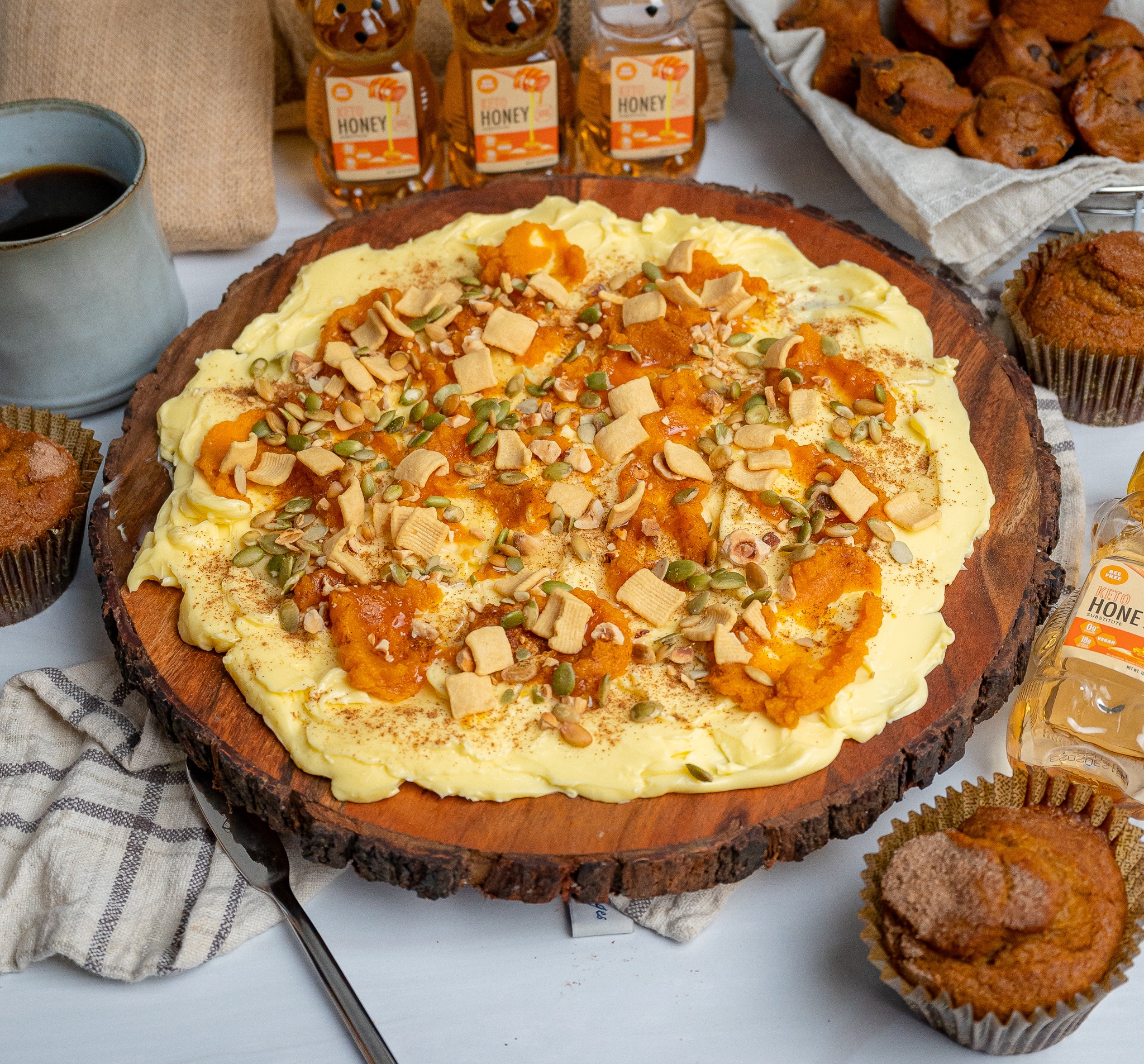 pumpkin spice butter board topped with keto honey, pumpkin seeds and pumpkin spice