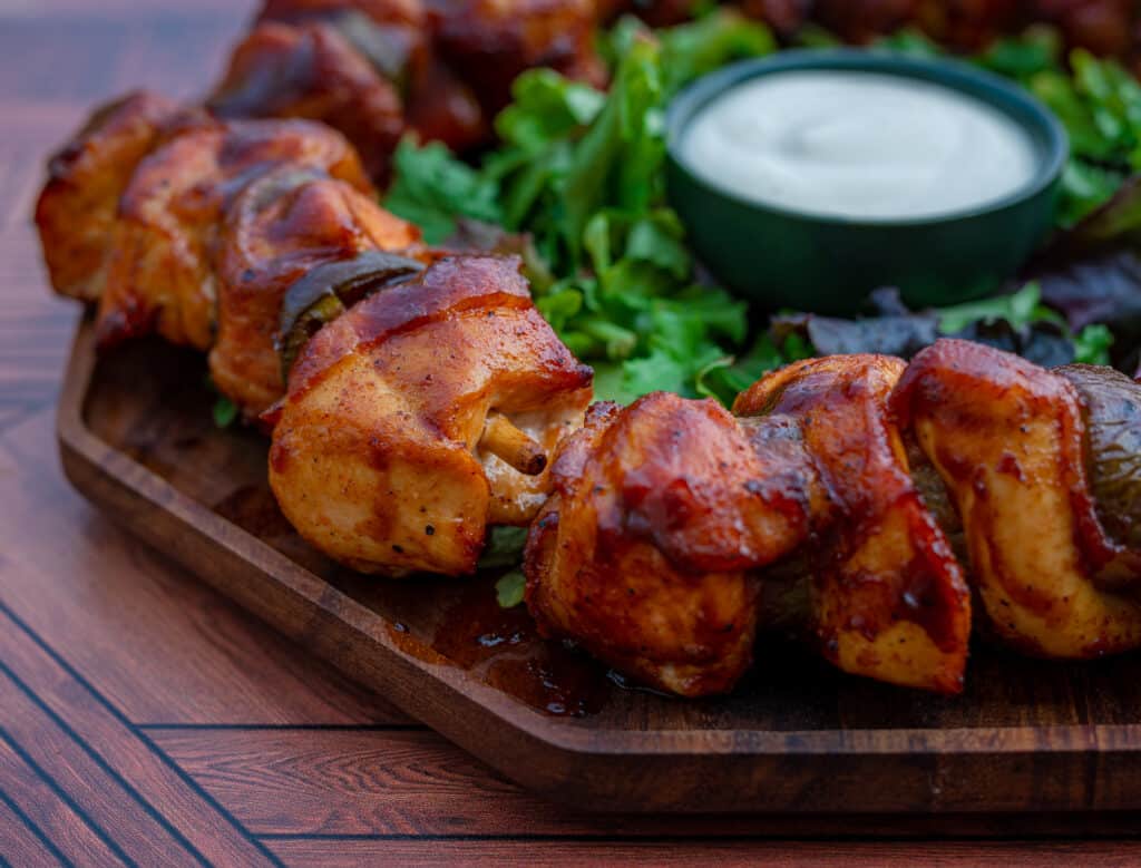 Tray of chicken jalapeño bacon skewers